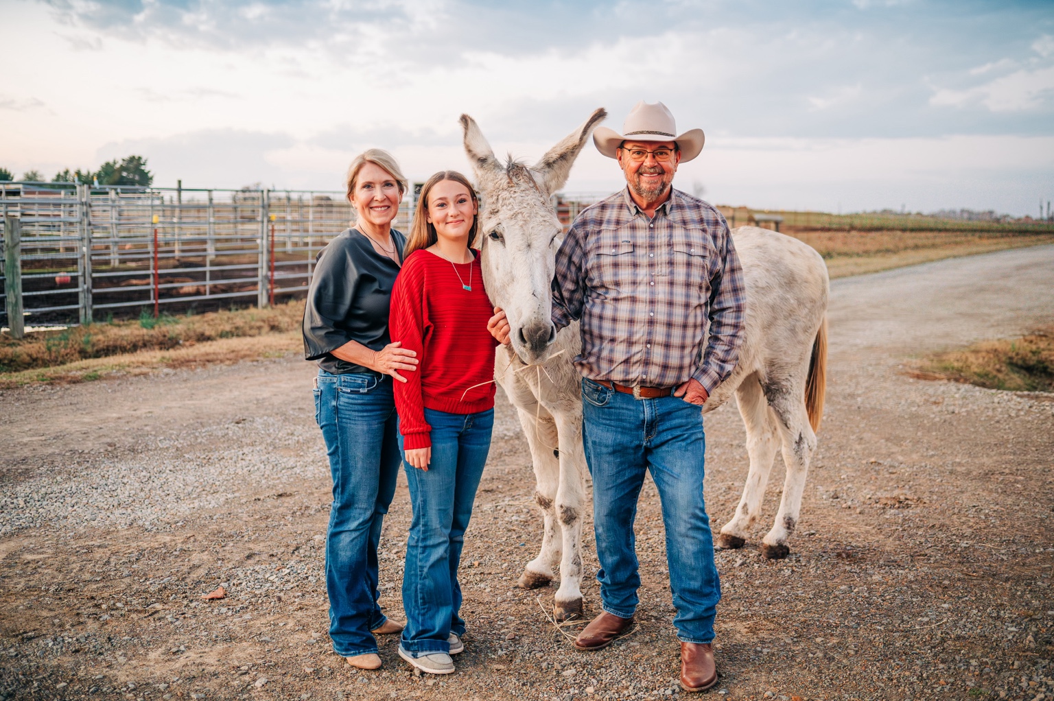 The Capps family together with one of their animals on the farm